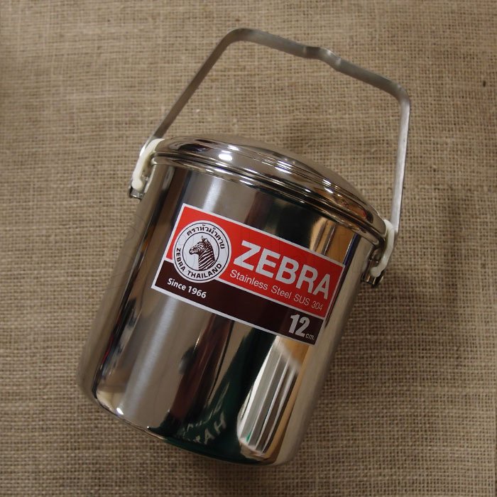 Boîte de conserve zébrée 12cm
